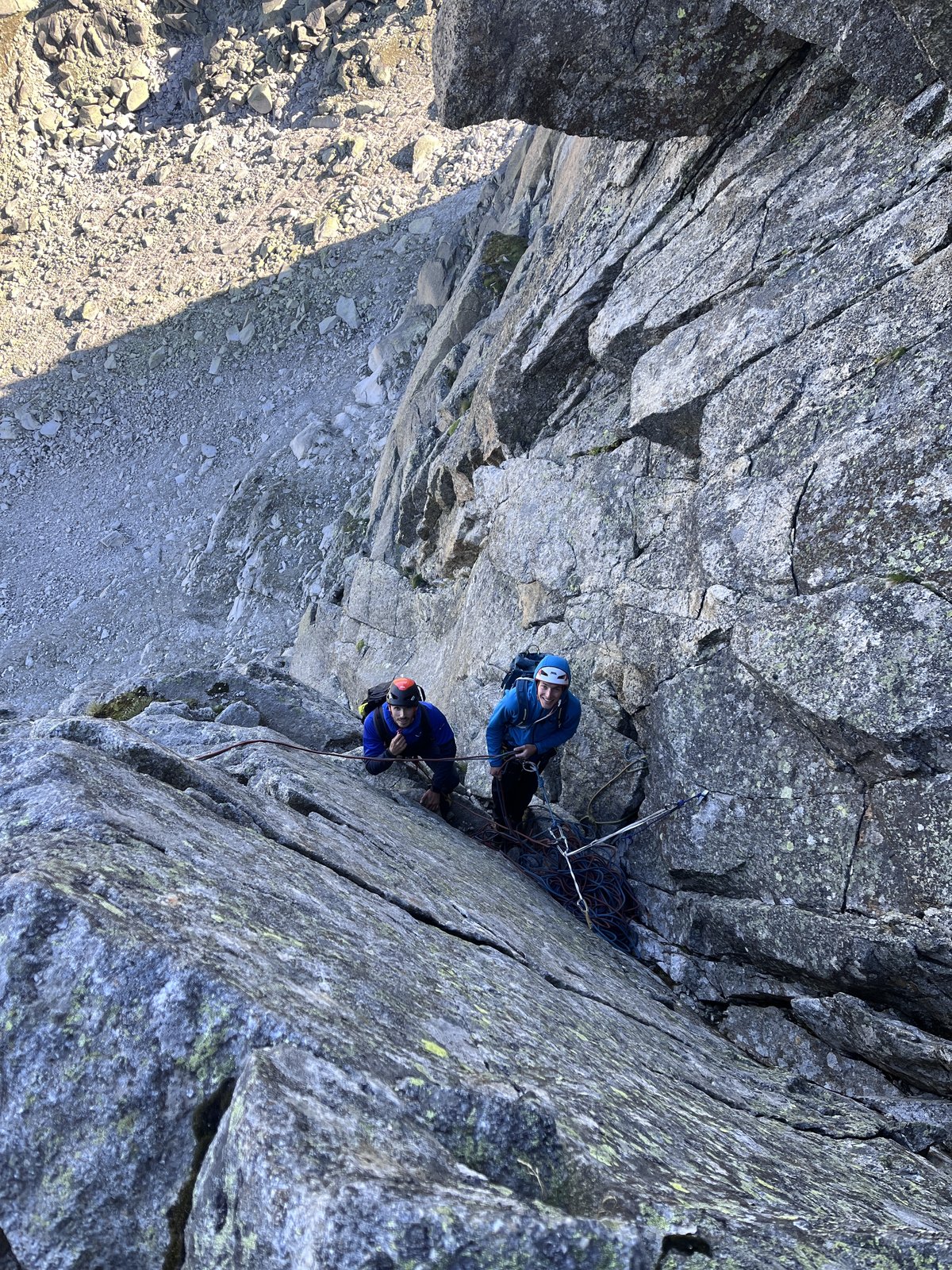 Moving up in the cool, in the shade of the north face.
