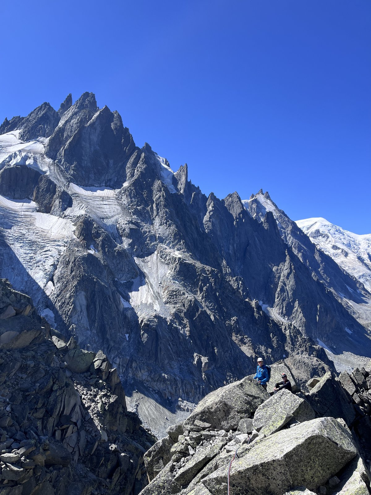 The granite of the Chamonix Aiguilles, the Mont Blanc massif behind.