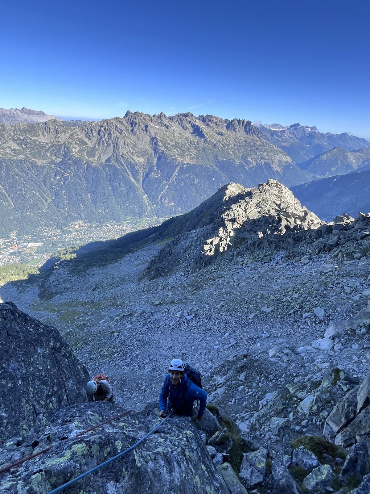 At the belay: Chamonix and the Aiguilles Rouges below.